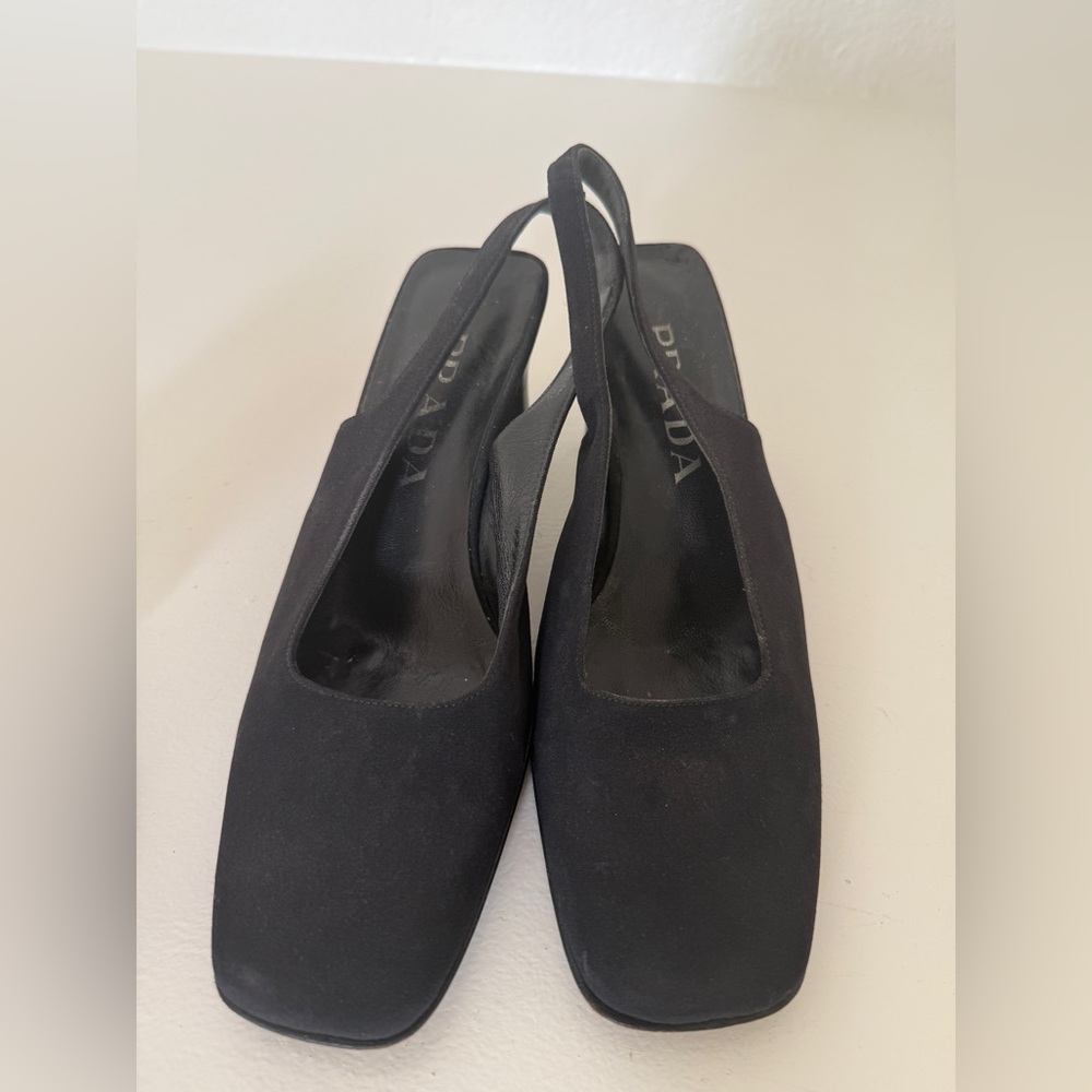 Prada squared toe sling back pumps. Black fabric.